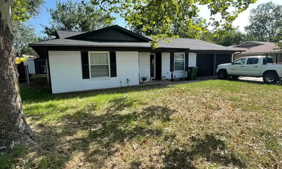 Professional roofing crew working on a residential roof in Hybla Valley